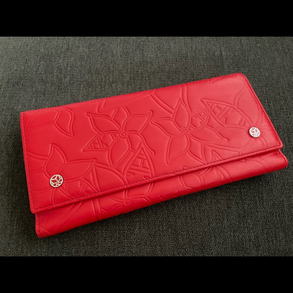 Carolina Herrera red embossed leather wallet.
